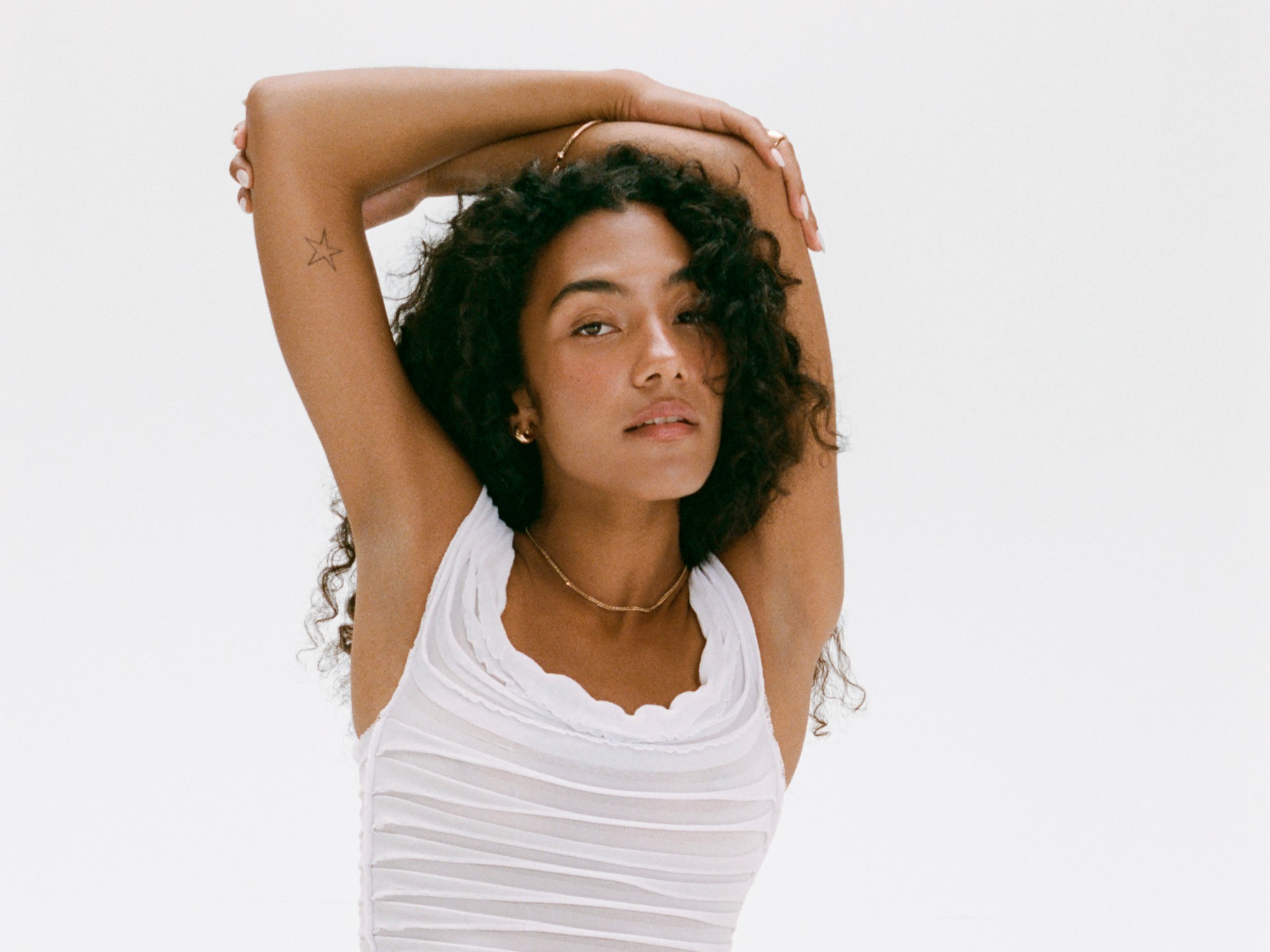 Olivia Dean “Man I Need” meaning explained with key lyric moments, 